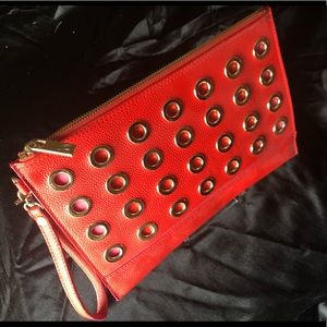 Neiman Marcus orange clutch with gold details